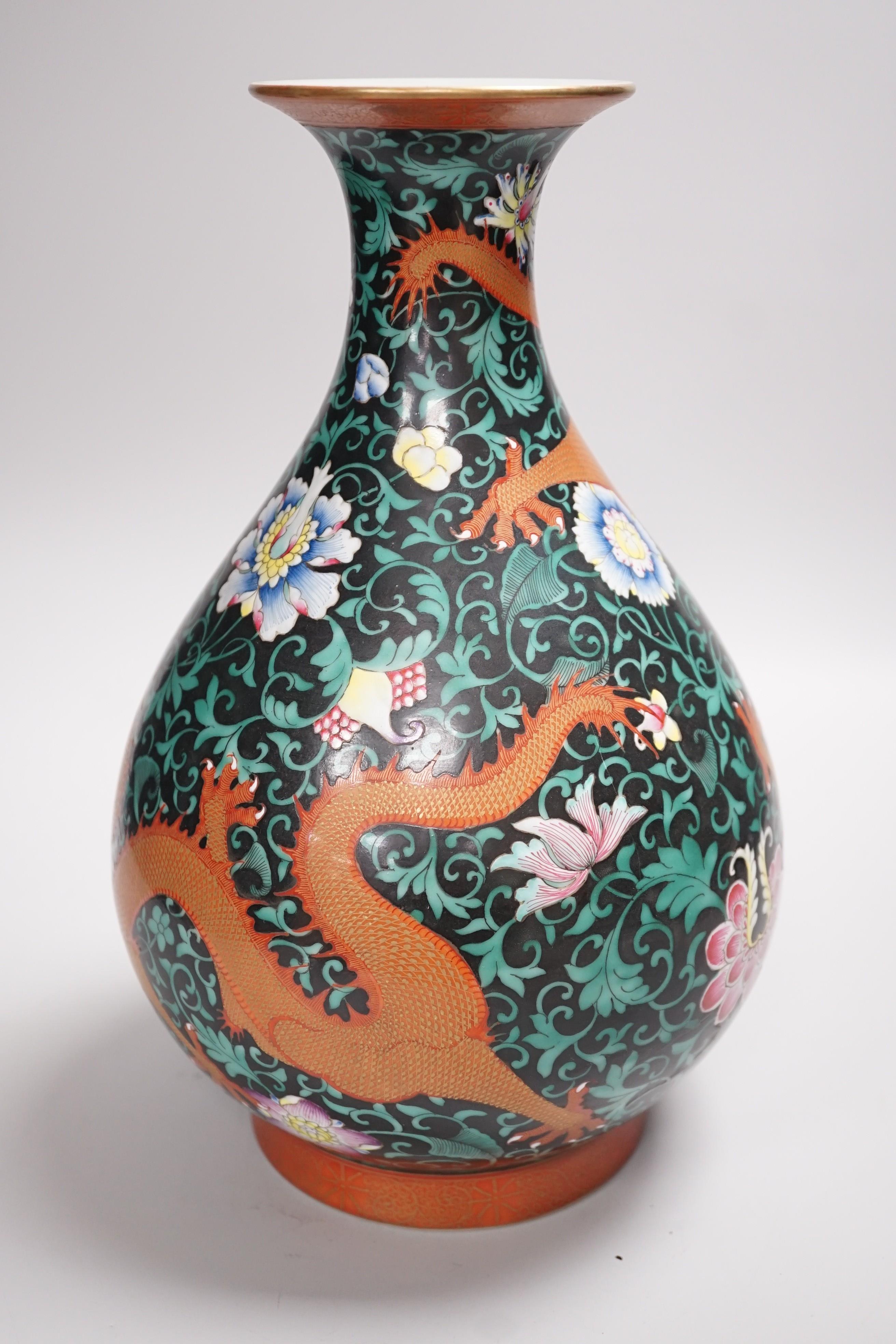 A Chinese enamelled porcelain 'dragon' vase, yuhuchunping, 31cm high